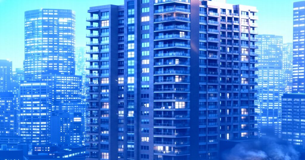 夜の都市部に立ち並ぶ高層マンションと住宅街の風景